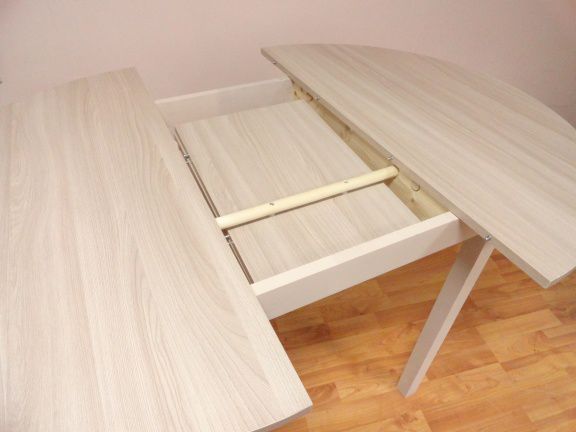 Стол обеденный раздвижной с круглой крышкой